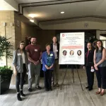 Dr. Julius Lucks and Dr. Sarah Woodson with students